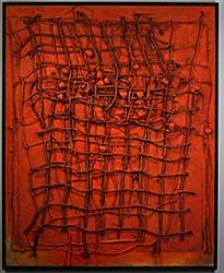 Abstract red textured painting with wire grid.